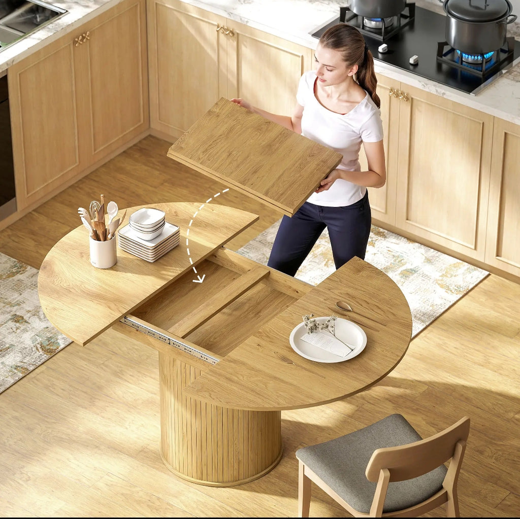 Mesa de Comedor Extensible Redonda a Ovalada para 6-8 Personas con Base Estriada y Acabado Madera Natural